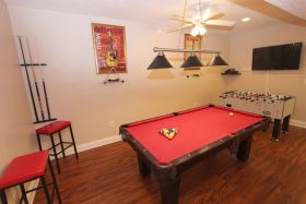 Game Room with Pool and Foosball Tables